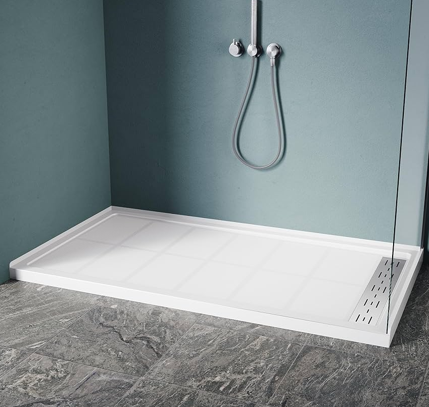 White shower pan with a glass screen and teal shower walls