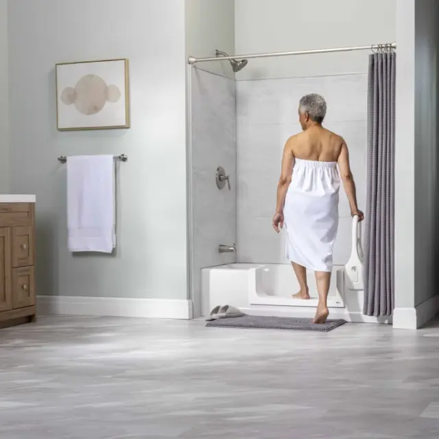 Clean Cut Step Female Stepping In with Tub Bar